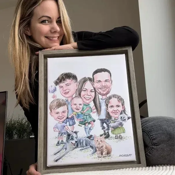 A customer holding a framed Picassify family caricature